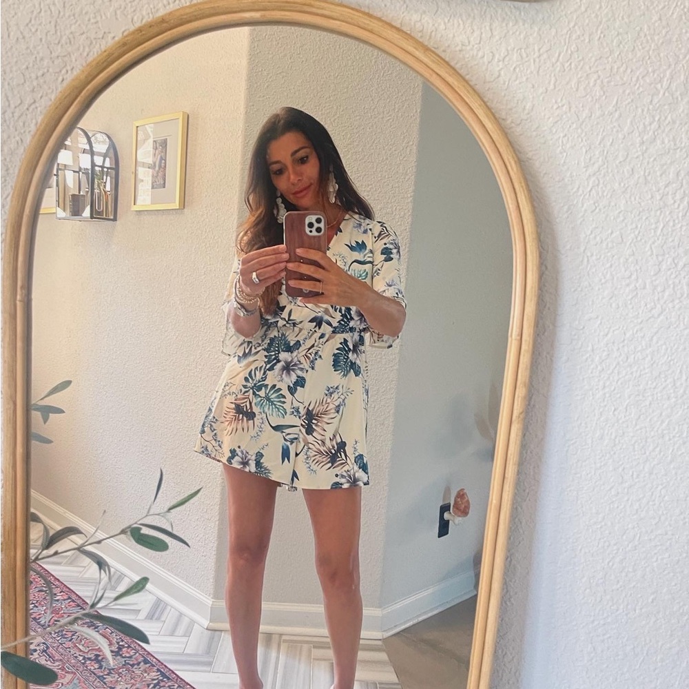 Pale yellow romper. Light material. Can dress up or down.